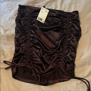 Brown silky skirt. From H&M. Never worn. Size medium. Can be made shorter